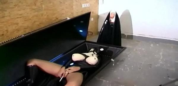  Fetish nun in latex has solo sex